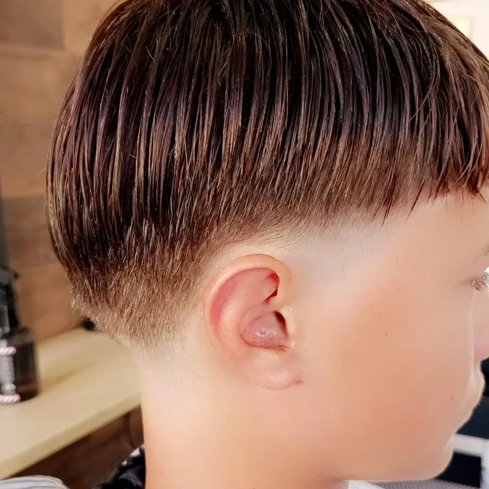 Coupe enfant dégradée réalisée chez Anis'N Coiffure, coiffeur familial à Coudekerque-Branche